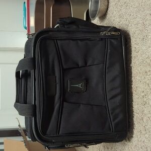 TRAVELPRO FlightPro Crew 16”x12”x 9” Soft side Carry-On Luggage, lots of Pockets